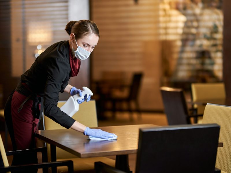 Dutiful restaurant staff being responsible about cleaning and sanitation