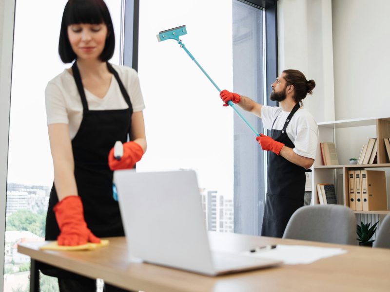 Multinational group cleans bright office.